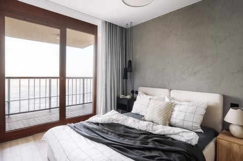 Cozy bedroom with ocean view